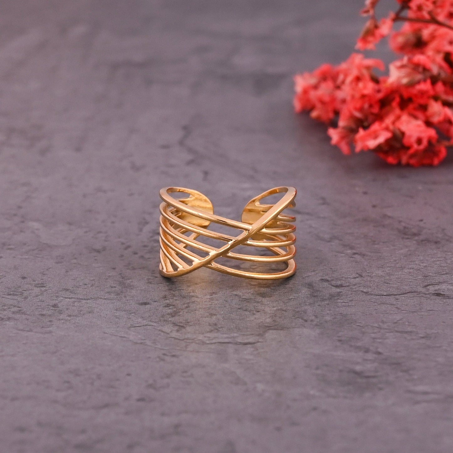 CKLAKART's Gold Tone Statement Ring with Wavy Accents