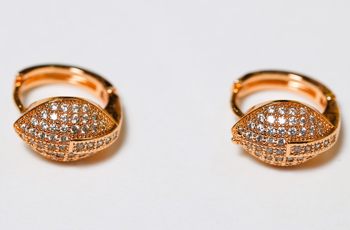 CKLAKART's Rose Gold Toned Earrings with Shimmering AD Leaf