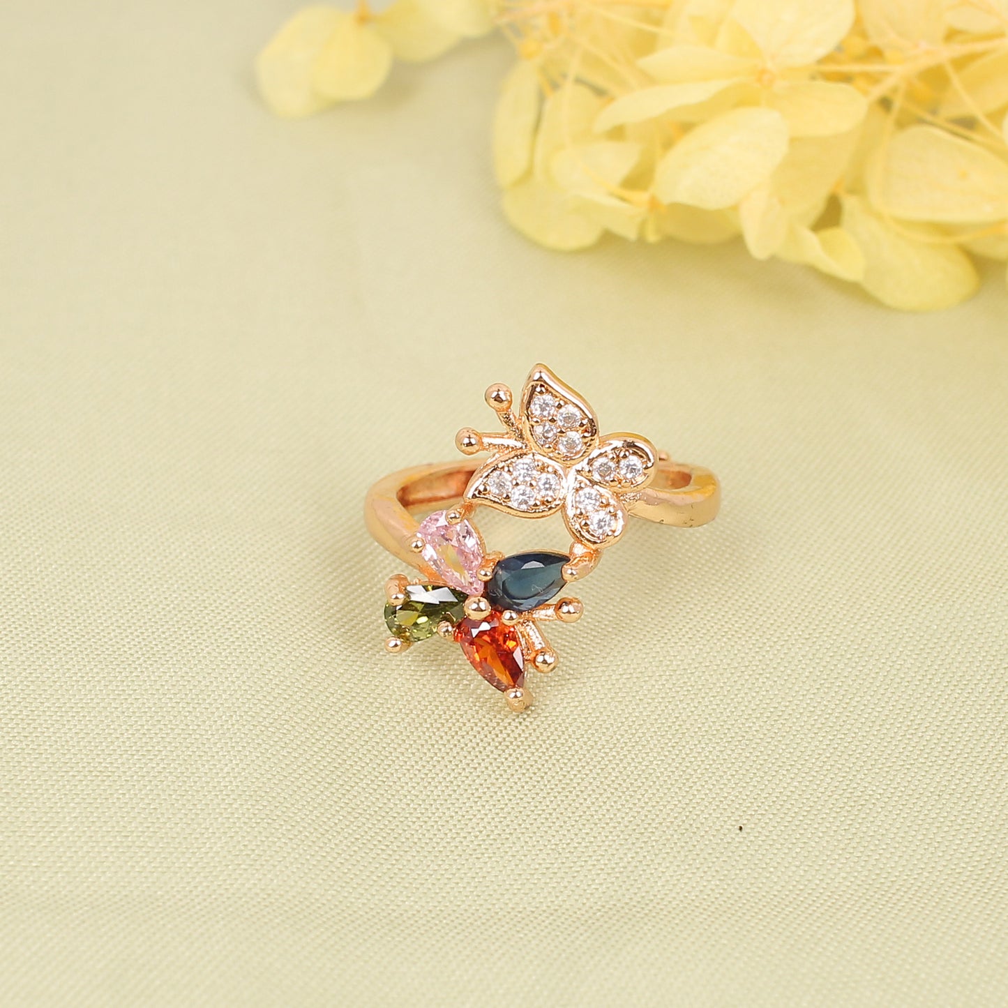 CKLAKART's Butterfly-Shaped Rose Gold Ring with Multicolored Gems