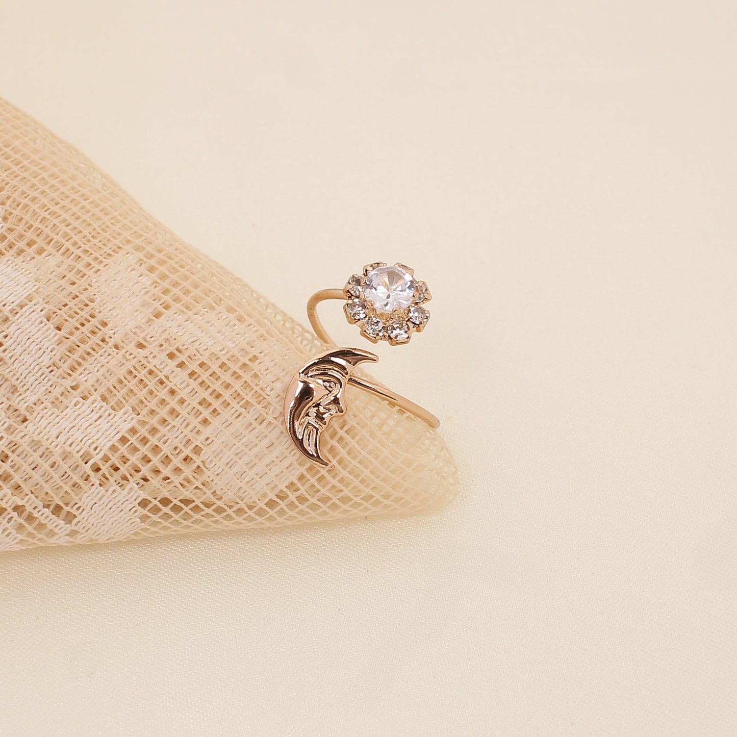 CKLAKART's Rose Gold Moon Ring with White Floral Accent