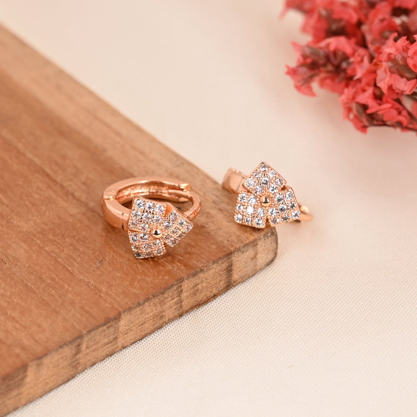 CKLAKART's Rose Gold Toned Earrings with Intricate Patterns