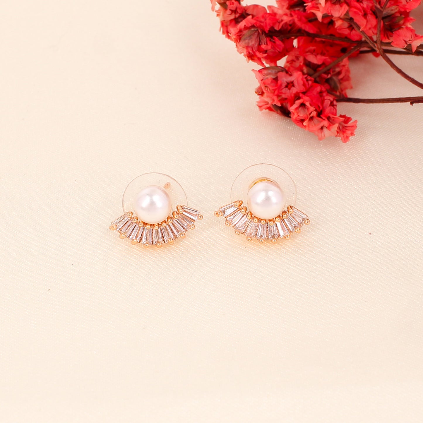 CKLAKART's Rose Gold Moon-Shaped Studs with Delicate Pearl Details