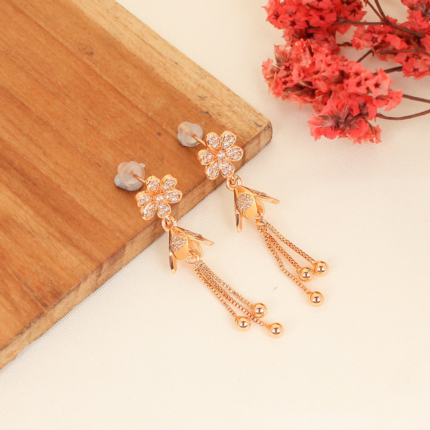 CKLAKART's Petal Drop Earrings in Elegant Rose Gold American Diamond accent