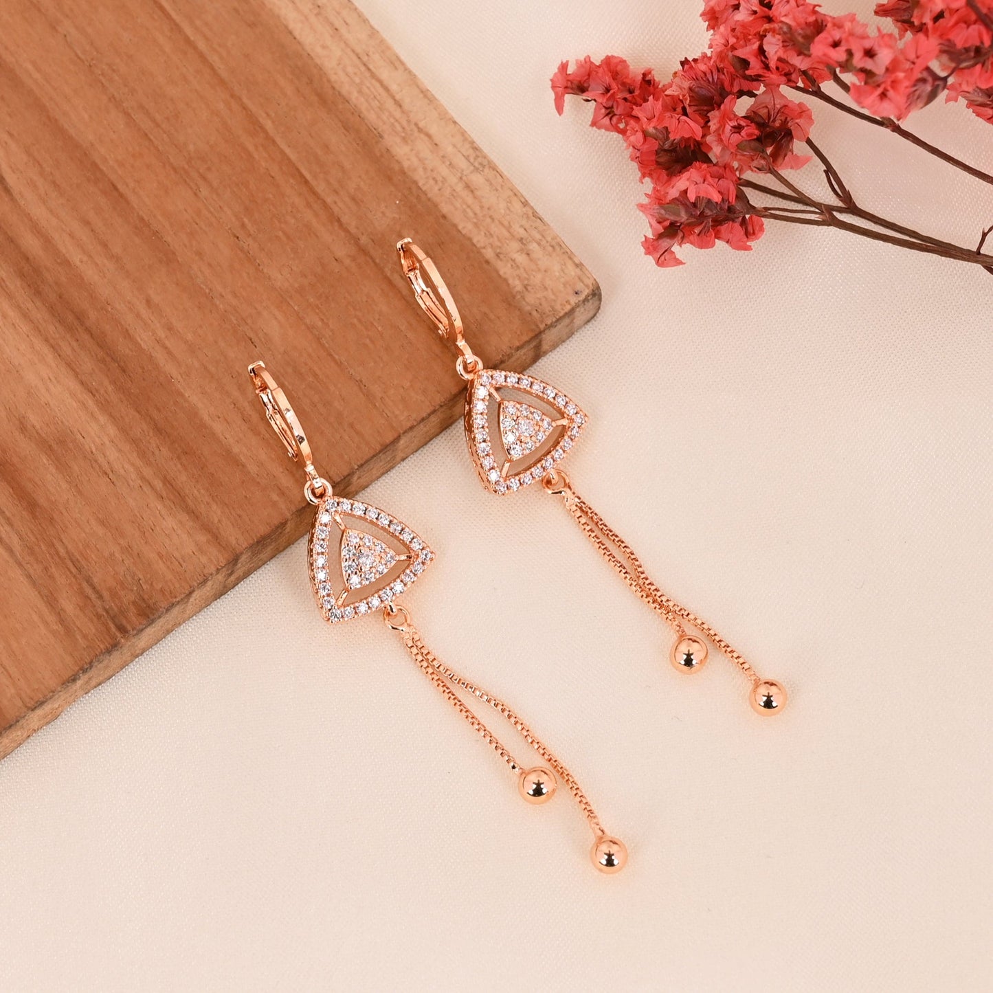 CKLAKART's Rose Gold Toned Earrings with AD Studded Triangles and Elegant Droplets