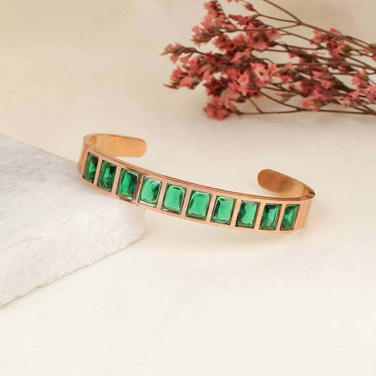 CKLAKART's Rose Gold Bracelet Featuring Dazzling Green Stones