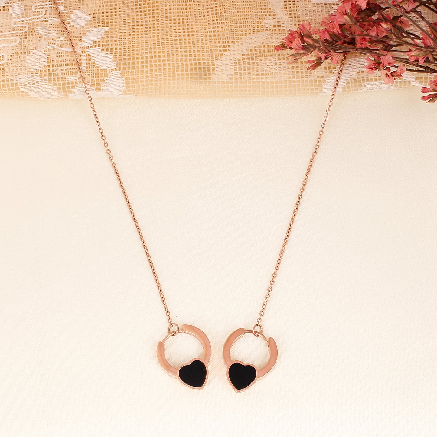 CKLAKART's Rose Gold Toned Neckpiece with Interlocking Heart Loops