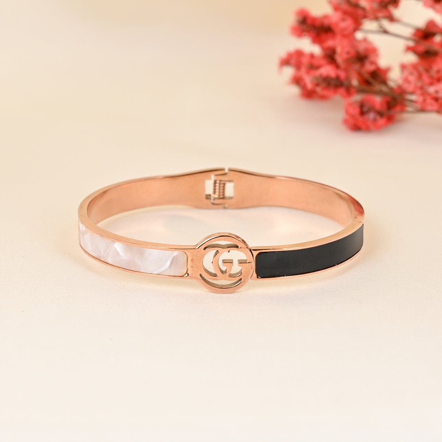 CKLAKART's Rose Gold Geometric Bracelet with Black and White Band