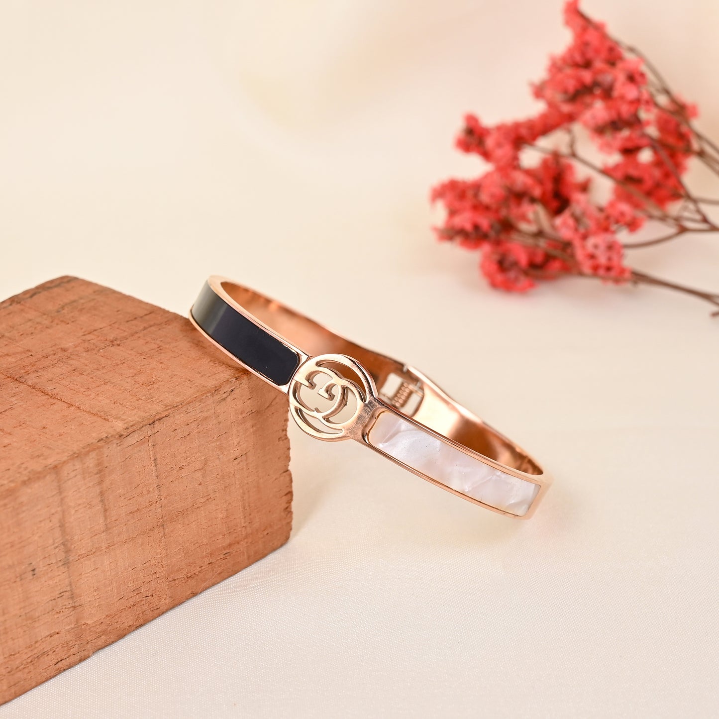 CKLAKART's Rose Gold Geometric Bracelet with Black and White Band