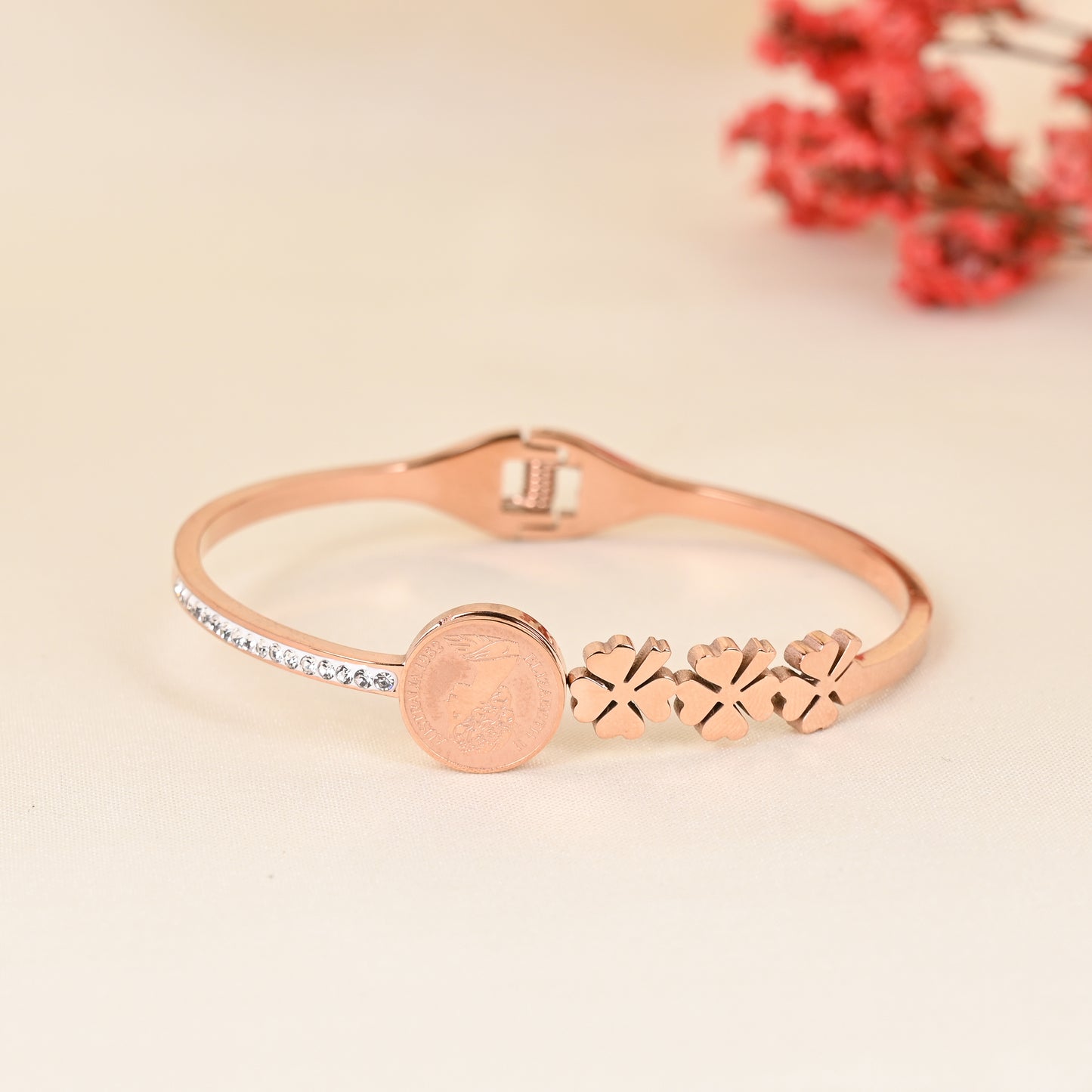 CKLAKART's Rose Gold Bracelet with Vintage Coin, Blooming Flowers, and White Stone Accents