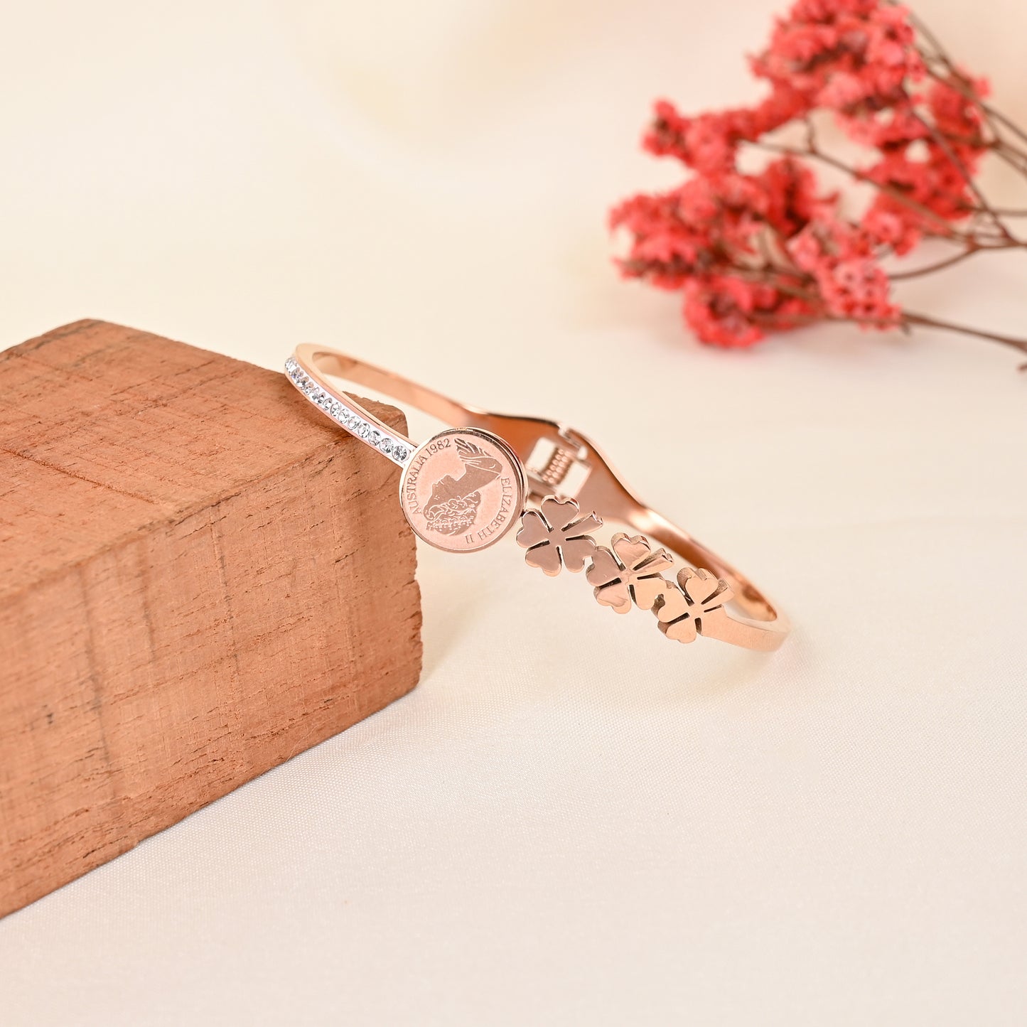 CKLAKART's Rose Gold Bracelet with Vintage Coin, Blooming Flowers, and White Stone Accents