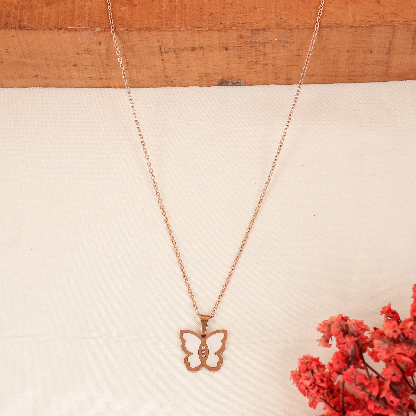 CKLAKART's Rose Gold Toned Necklace with Butterfly Pendant