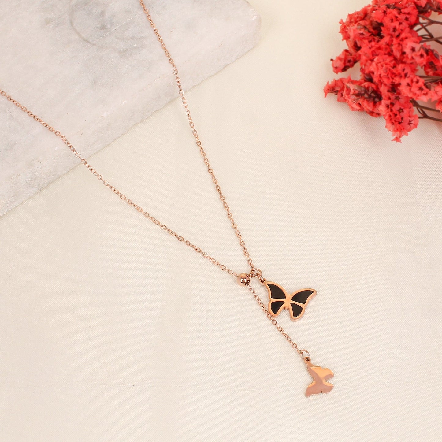 CKLAKART's Rose Gold Toned Necklace with Butterfly Droplets