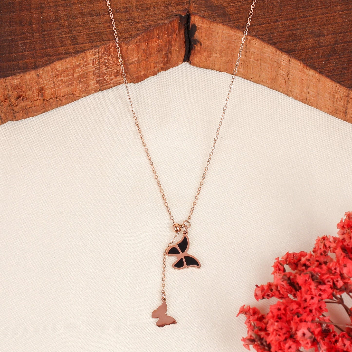 CKLAKART's Rose Gold Toned Necklace with Butterfly Droplets