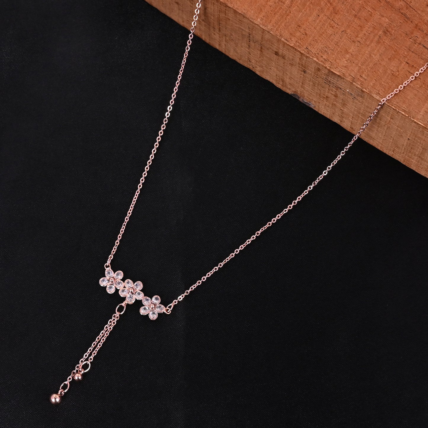 CKLAKART's Rose Gold Toned Necklace with Delicate White Stone Flowers and Beaded Droplets