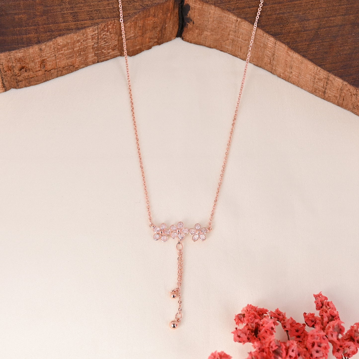 CKLAKART's Rose Gold Toned Necklace with Delicate White Stone Flowers and Beaded Droplets