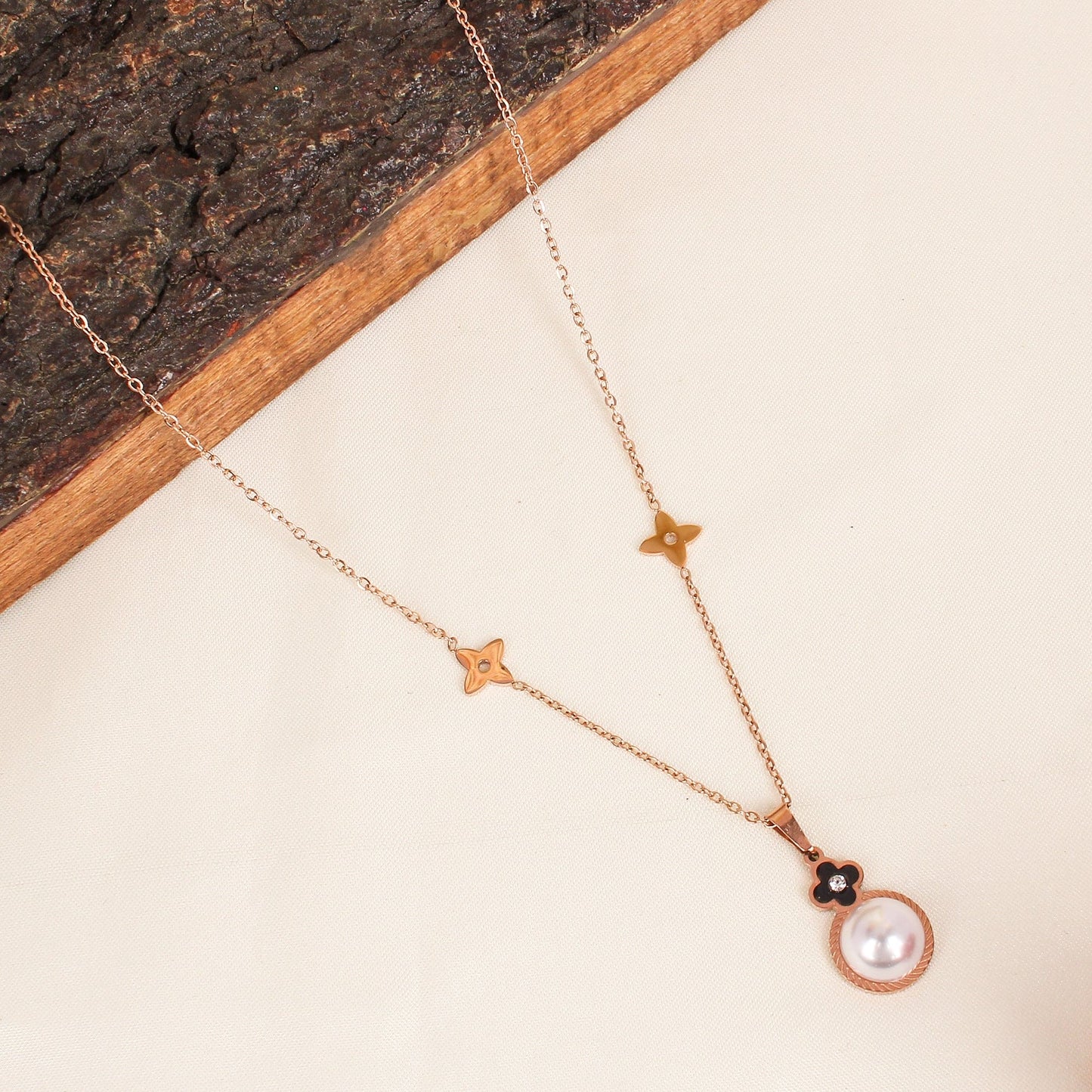 CKLAKART's Rose Gold Toned Necklace with Pearl Pendant Accent