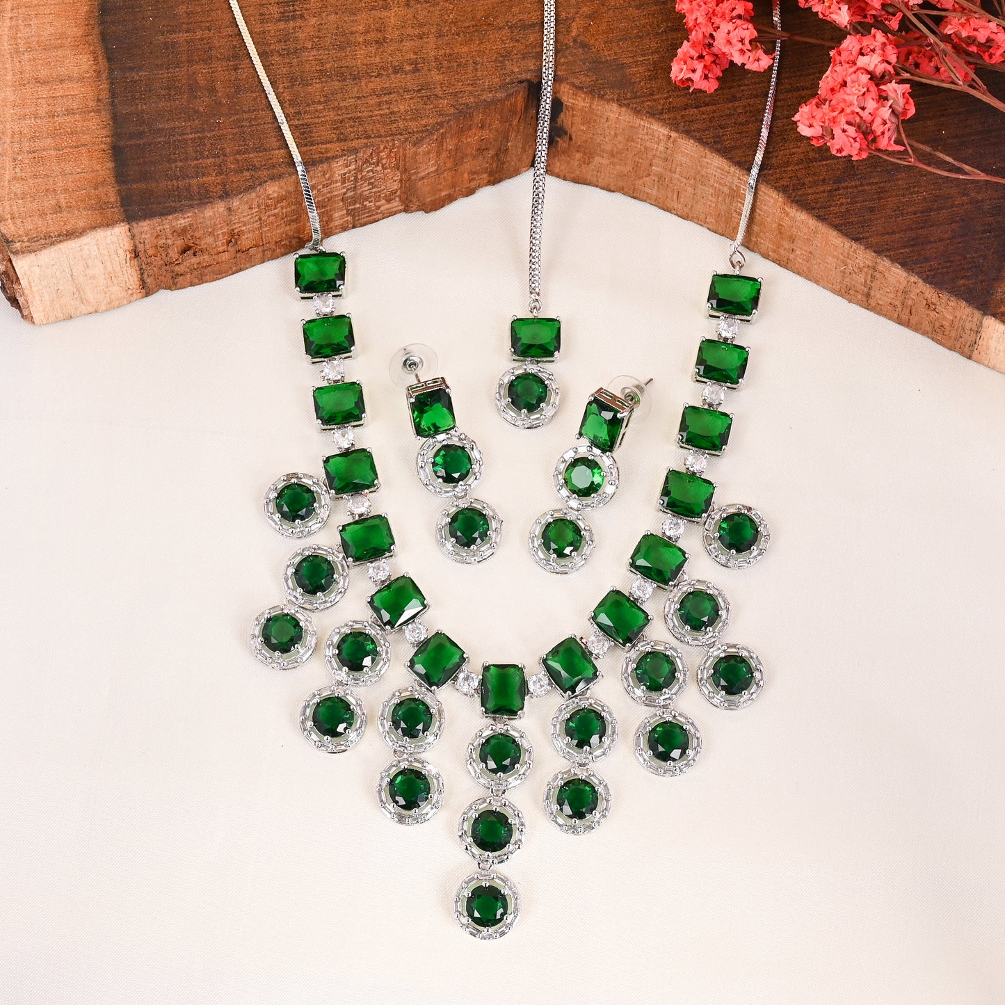 CKLAKART's NOOR American Diamond and Green Stone Necklace Ensemble with Maang Tika and Earrings