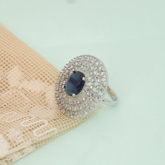 CKLAKART's Silver-Toned Oval Blue Sapphire Ring with Three Layers of White Stones