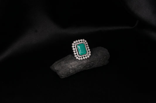 CKLAKART's Silver-Toned Statement Ring with Emerald Green Center and White Stone Embellishments