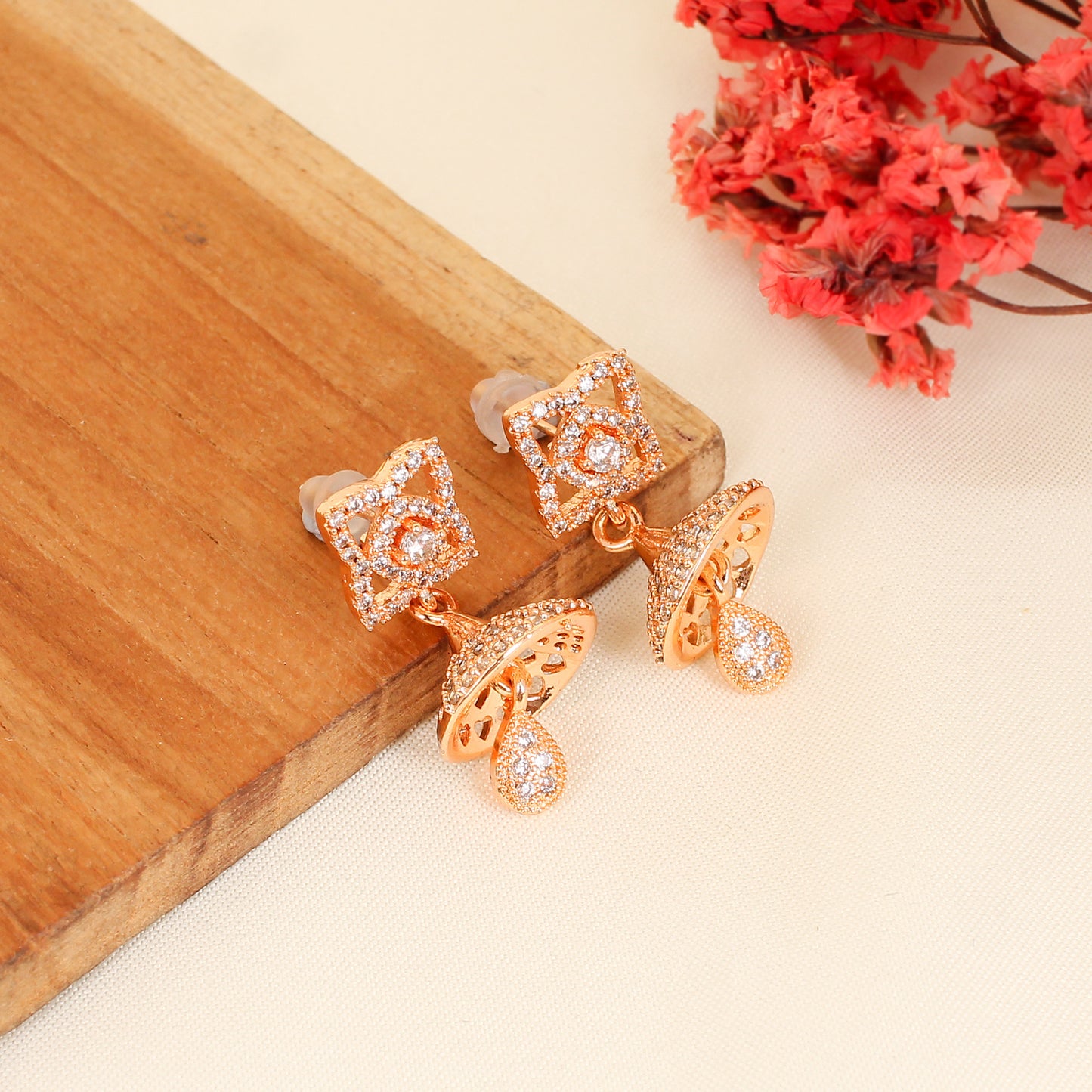 CKLAKART's Rose Gold American Diamond Jhumki Earrings