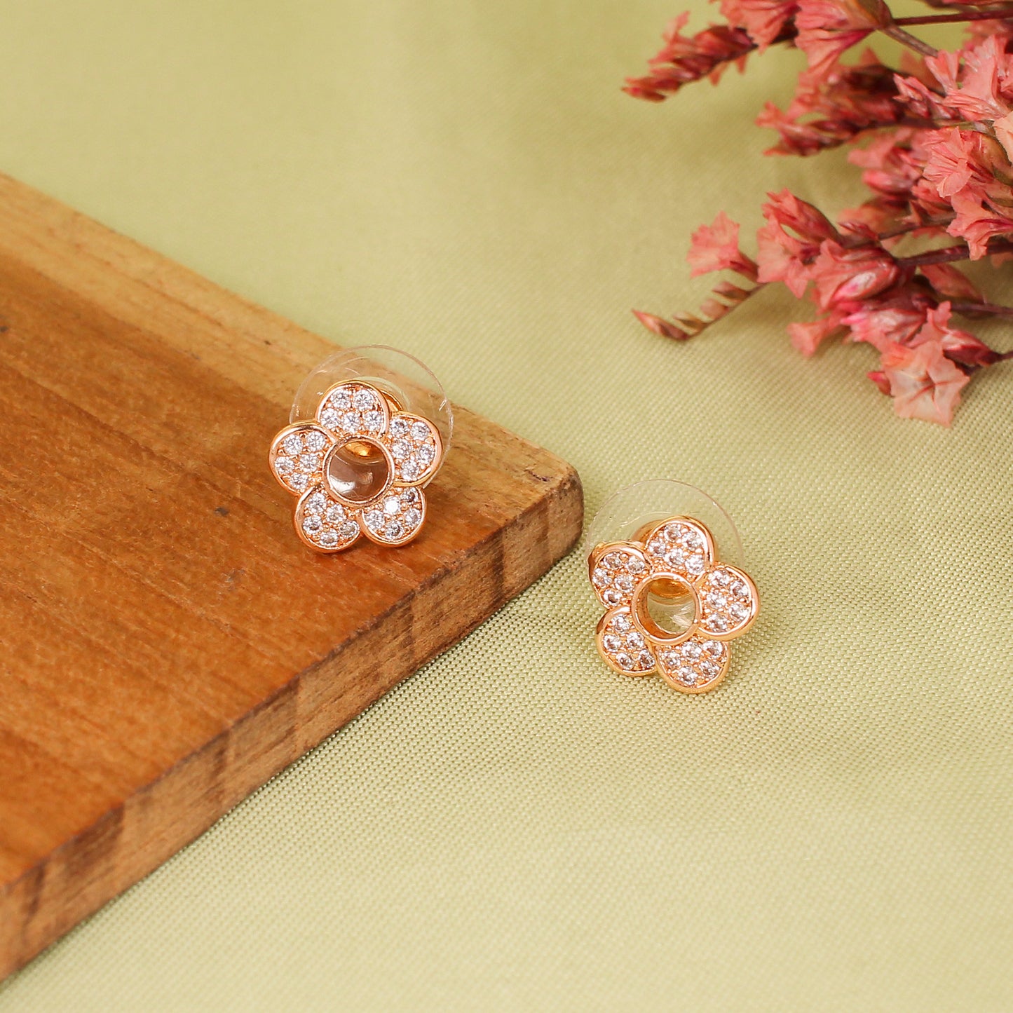 CKLAKART's Rose Gold-Toned AD Studs with Elegance of Blooms