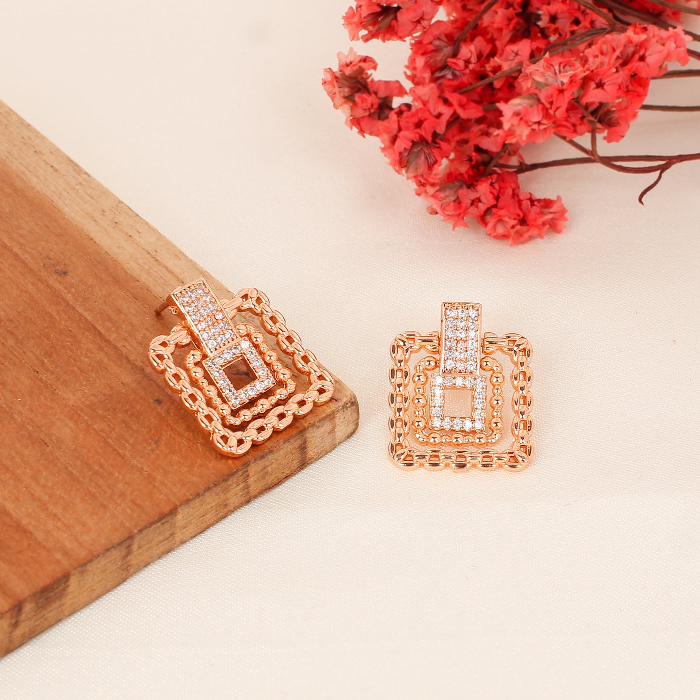 CKLAKART's Rose Gold American Diamond Stud Earrings