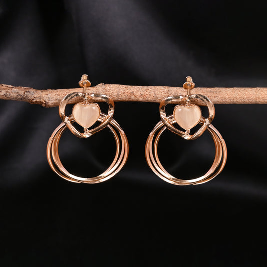 CKLAKART's Gold Toned Heart Shaped Dangle Earrings