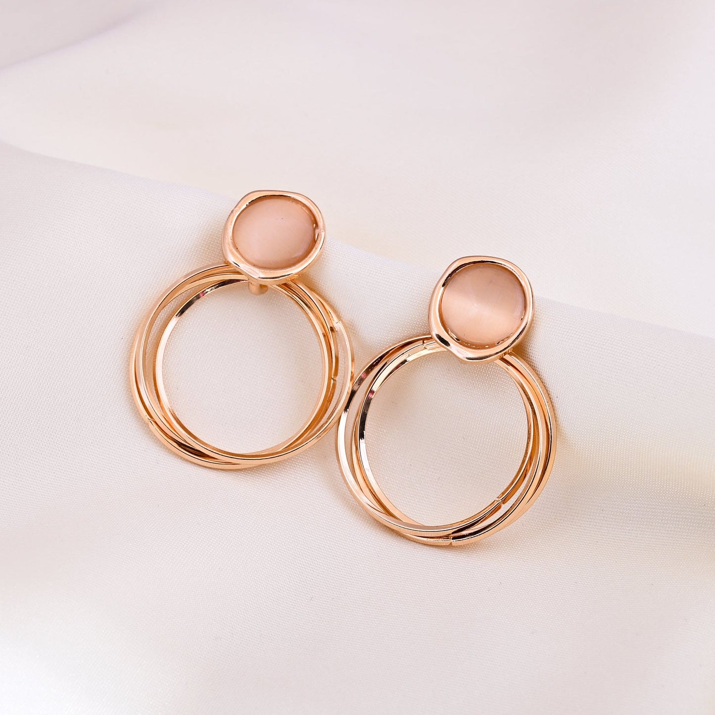 CKLAKART's  Rose Gold circle Shaped Dangle Earrings