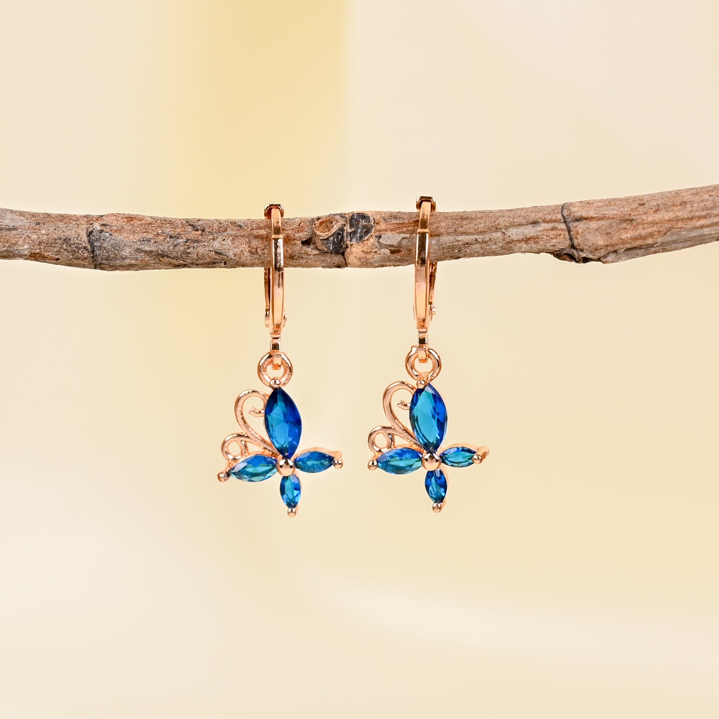 CKLAKART's Small Hoops with Blue Stone Butterfly Accents