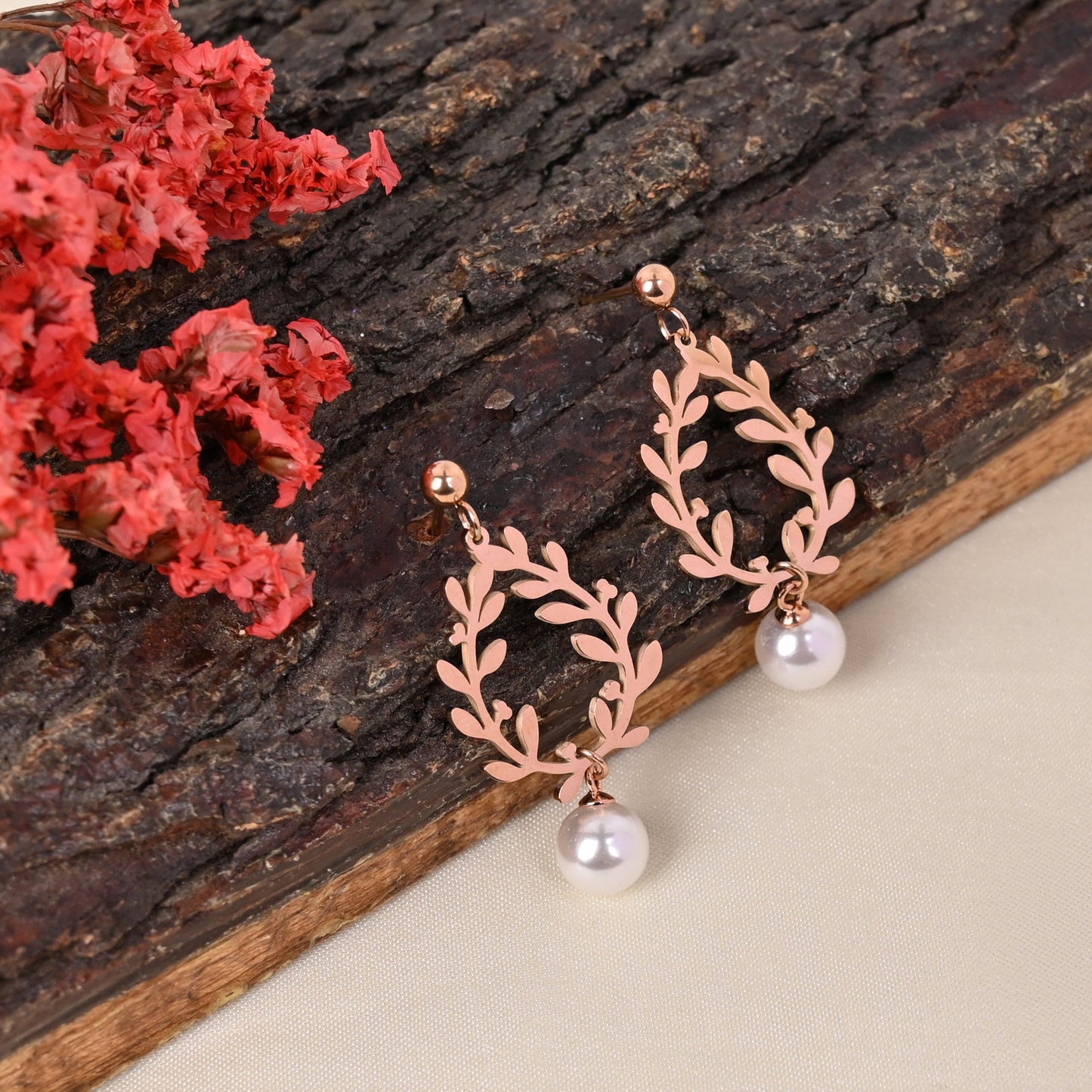 CKLAKART's Rose Gold Toned Leaf and Pearl Stud Earrings