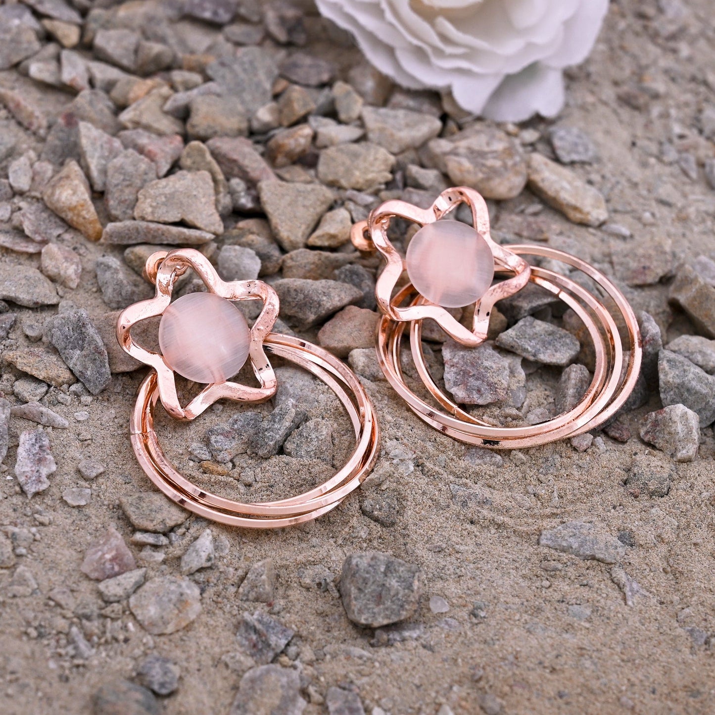 CKLAKART's Rose Gold Toned Star Shaped Dangle Earrings