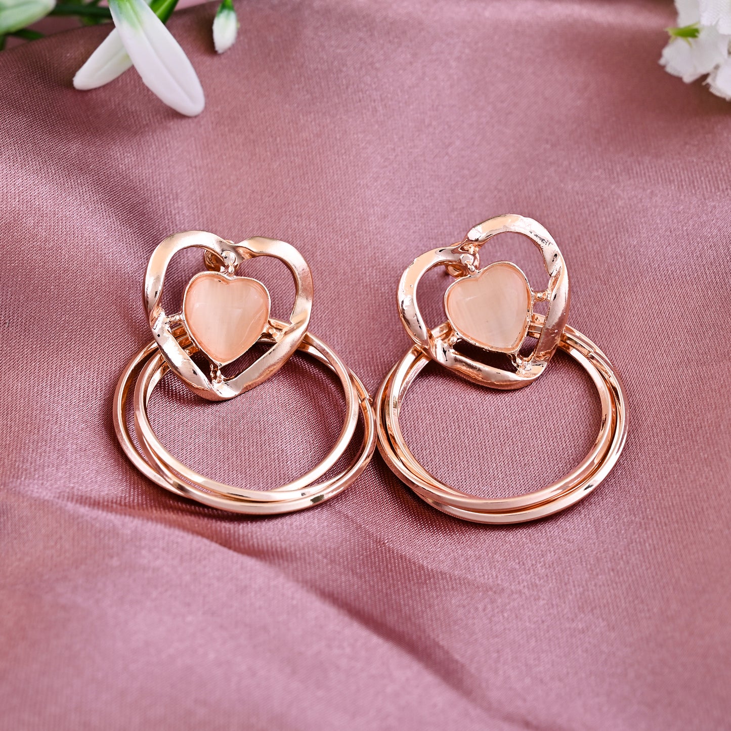 CKLAKART's  Rose Gold Toned Heart Shaped Danglers