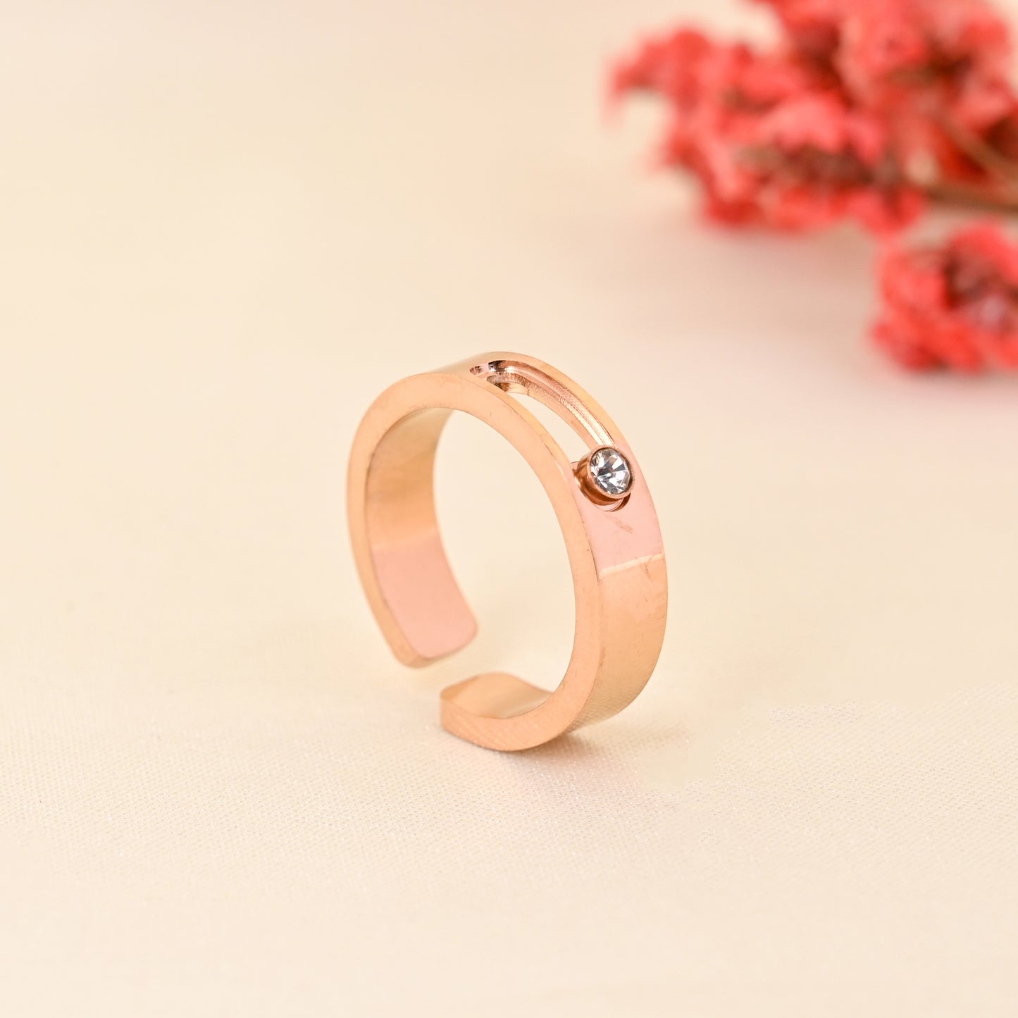 CKLAKART's Rose Gold Toned Moving Stone Cocktail Ring