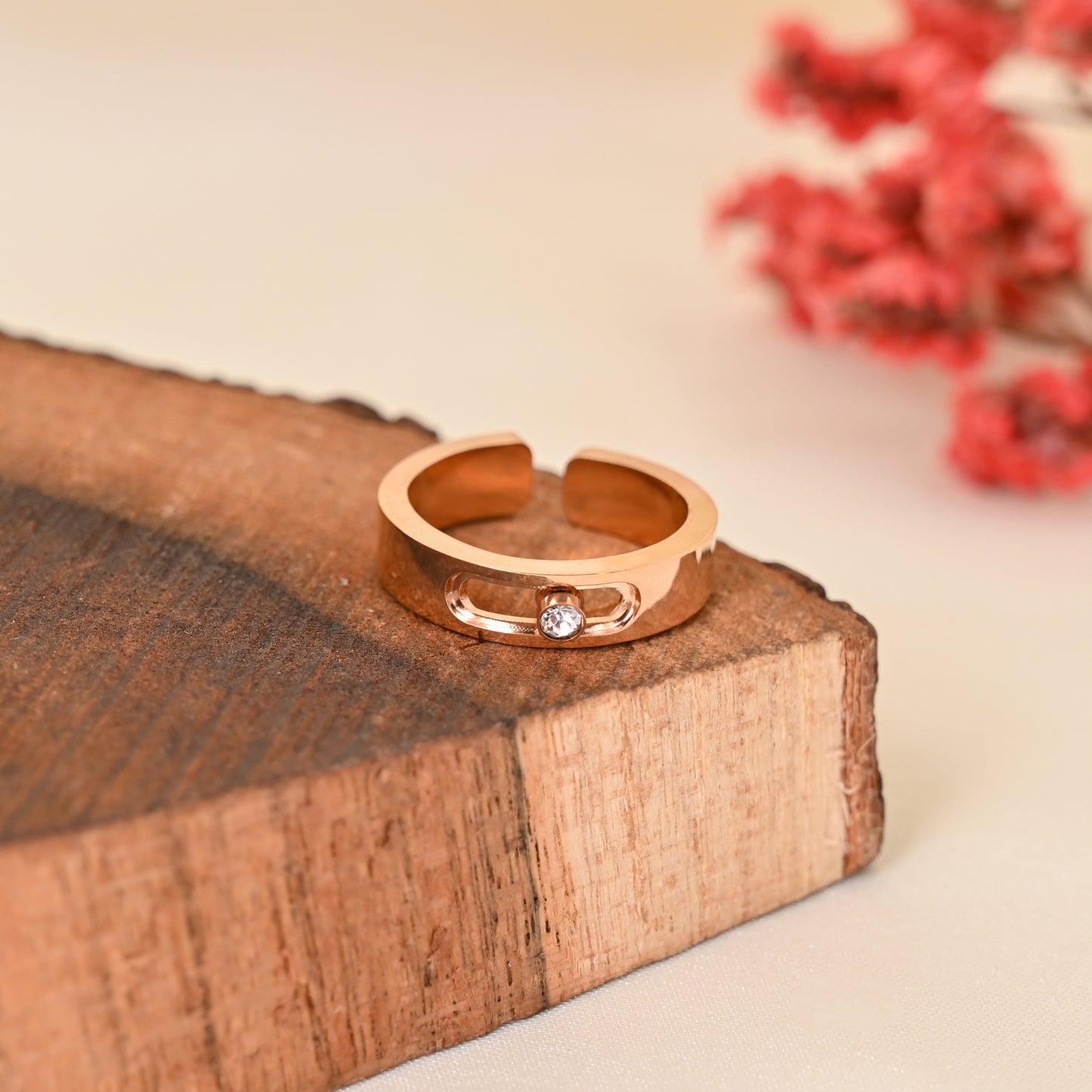 CKLAKART's Rose Gold Toned Moving Stone Cocktail Ring