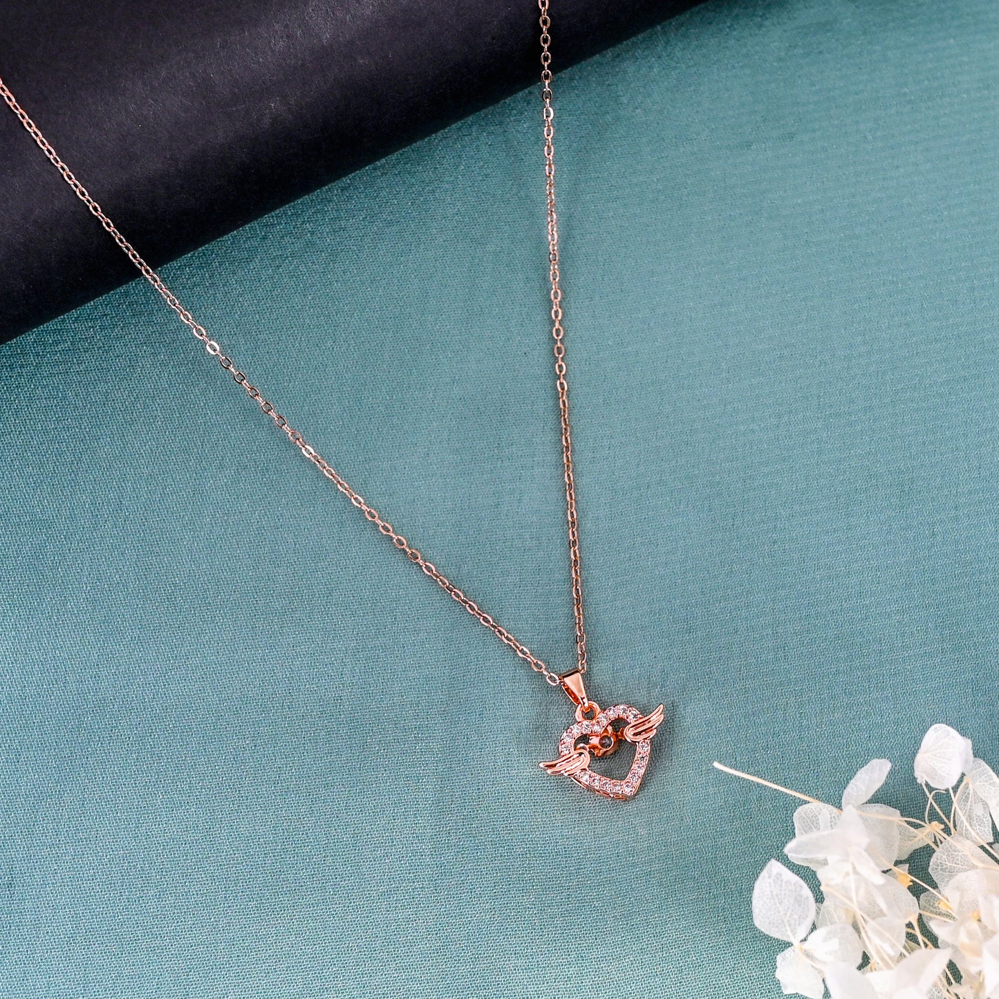 CKLAKART's Rose Gold Toned Cupid's Heart Pendant with Sparkling AD and Chain