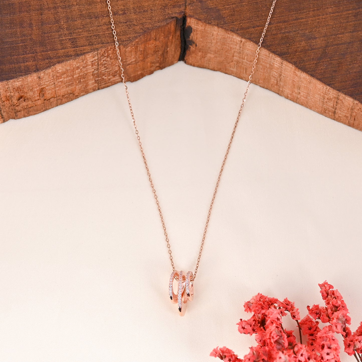 CKLAKART's Rose Gold Toned Statement Pendant with Shimmering AD and Chain