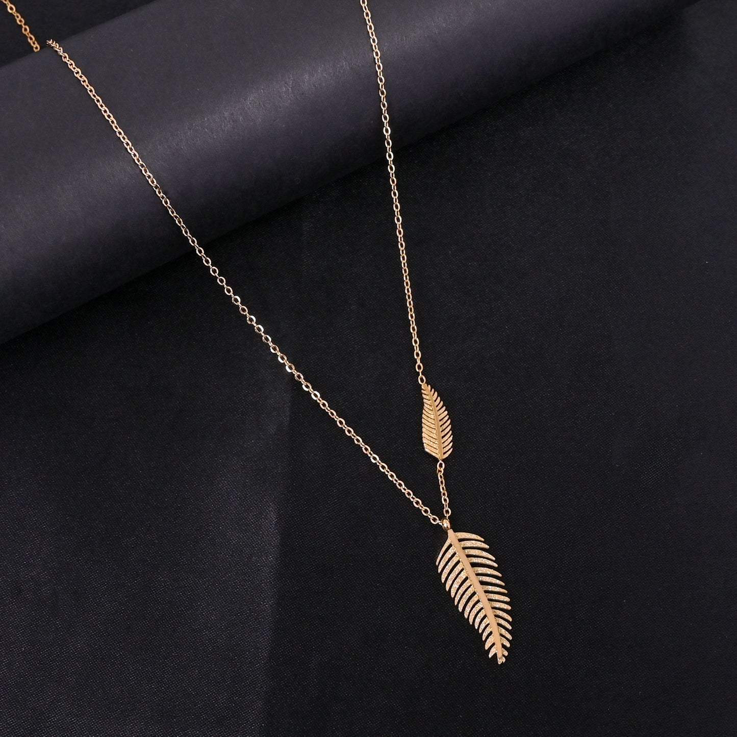 CKLAKART's Gold Toned Palm Leaf Pendant Necklace