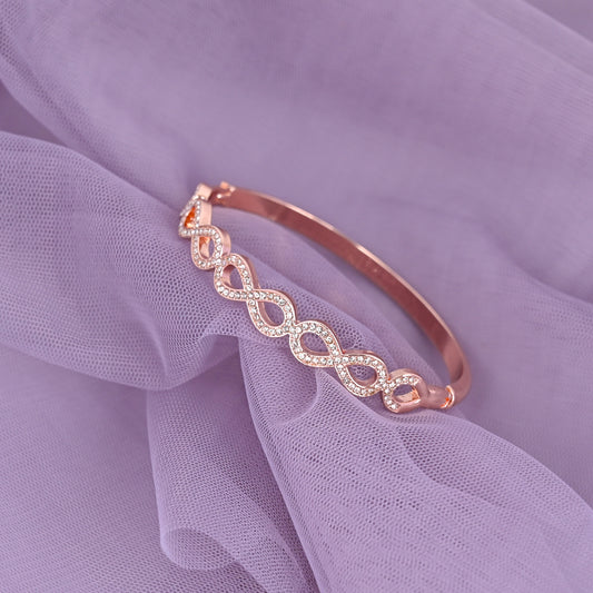 CKLAKART's Rose Gold Toned Geometric Interlock Drops Bracelet