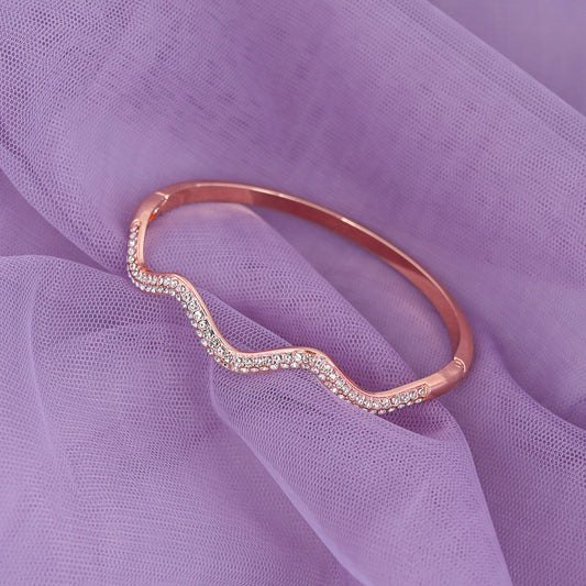 CKLAKART's Rose Gold Toned Wavy Cocktail Bracelet