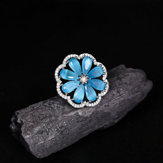 CKLAKART's NOOR Elegant Silver Ring Featuring Blooming Flower Design with Topaz Blue Stone and American Diamonds