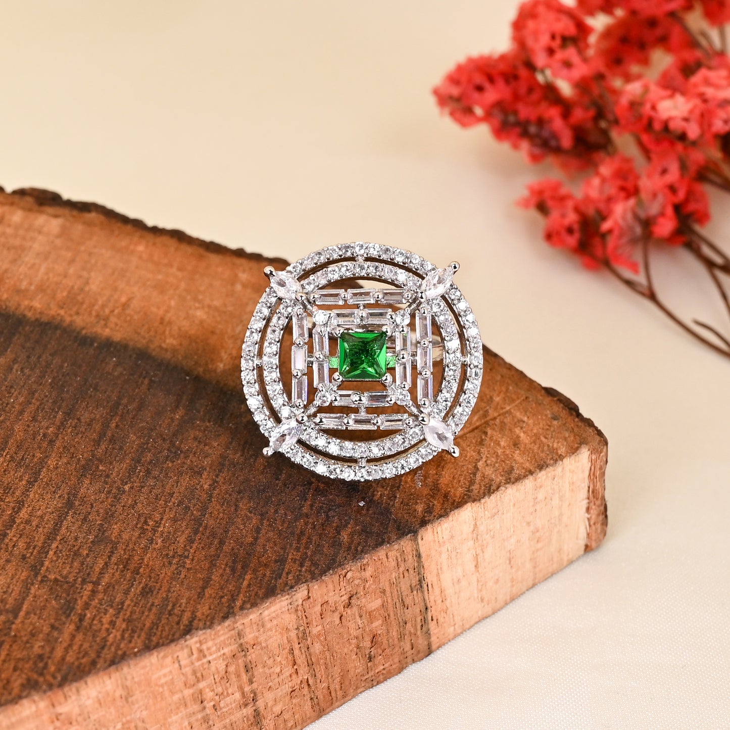 CKLAKART's NOOR Silver-Toned Ring Adorned with Emerald Green Stone and Sparkling American Diamonds