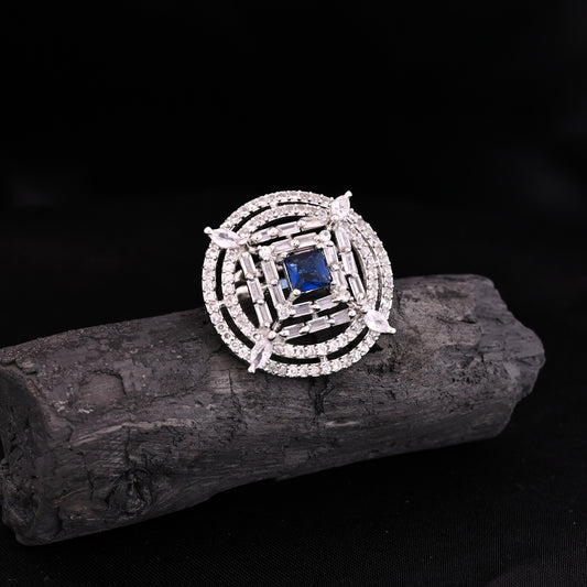 CKLAKART's NOOR Silver-Toned Ring Adorned with Blue Sapphire Stone and Sparkling American Diamonds