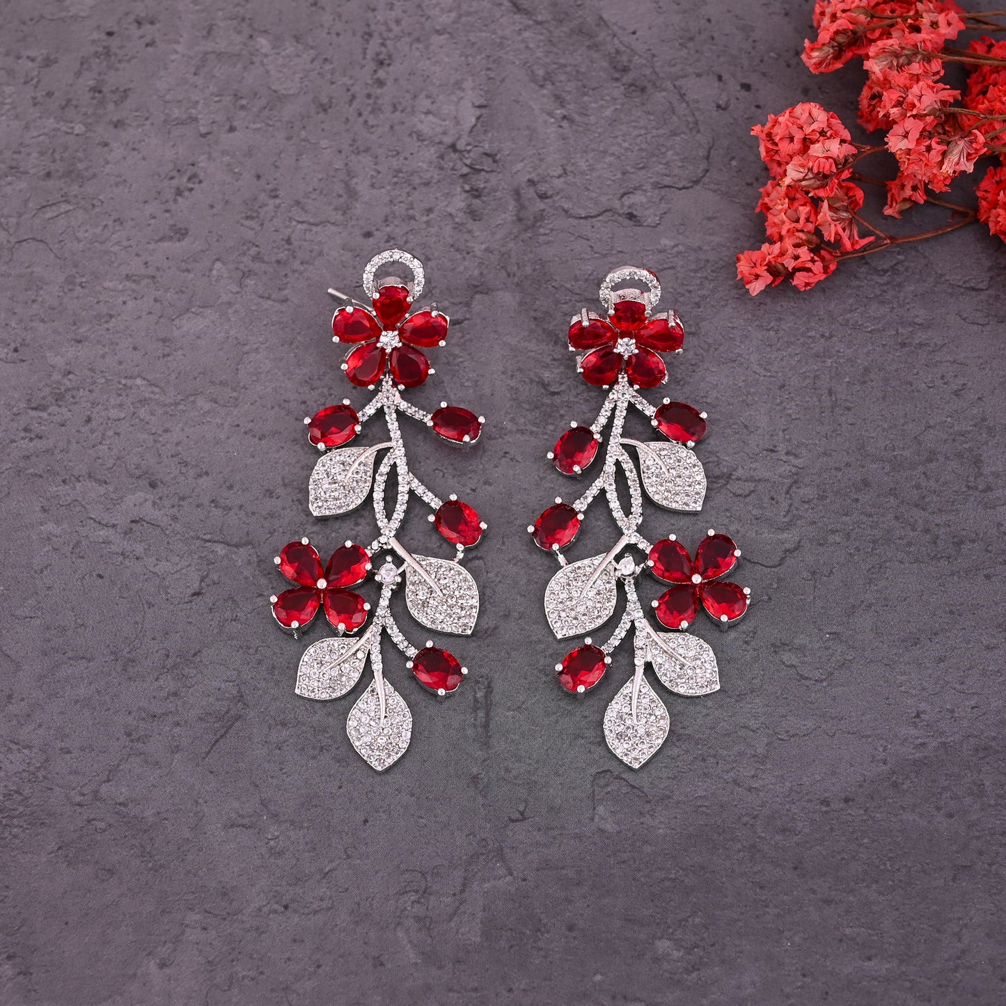 CKLAKART's NOOR Silver Flower Earrings Featuring Ruby Color Stones and Sparkling American Diamonds