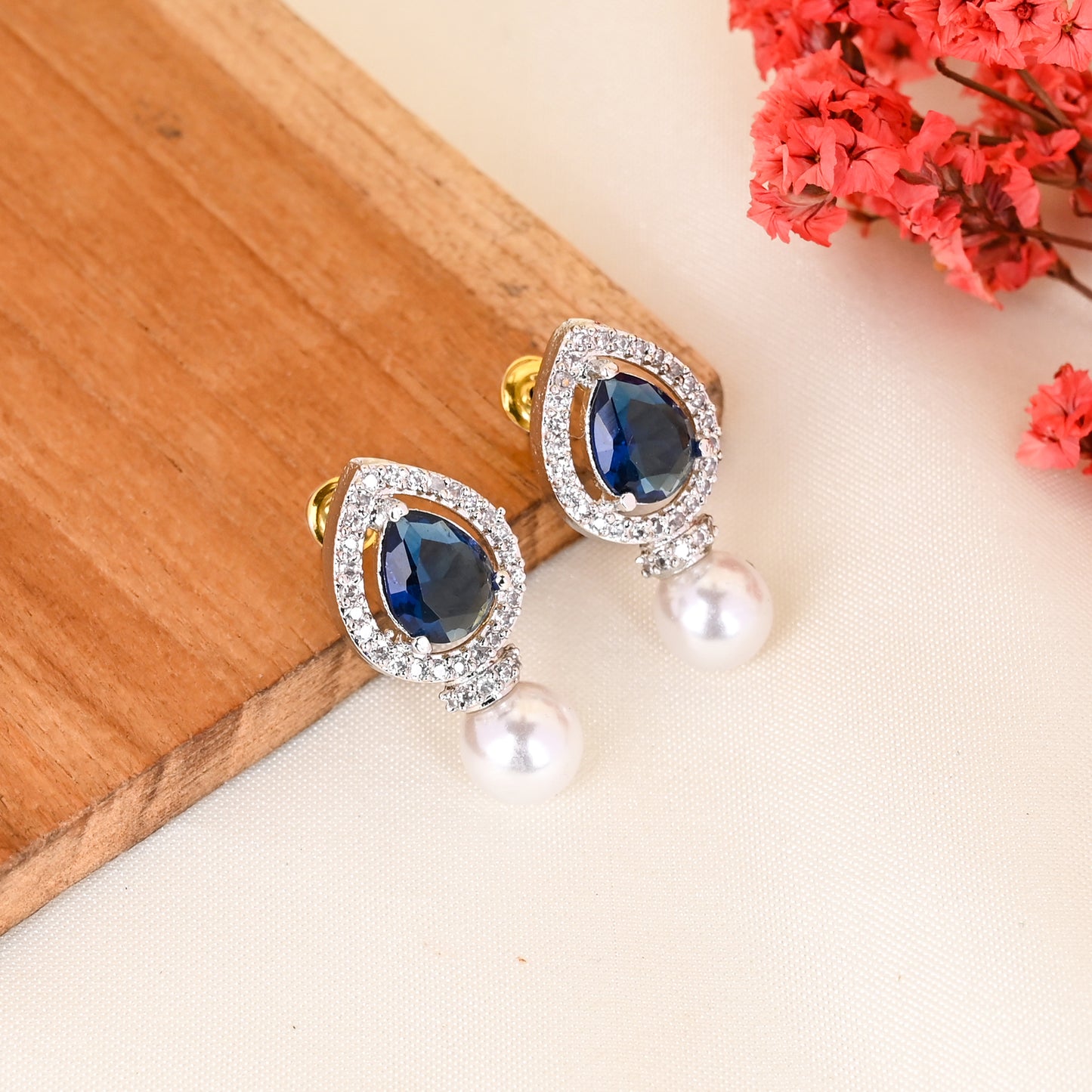 CKLAKART's NOOR Classic Silver-Toned Pearl Drop Earrings with Blue Sapphire Color Stones and Sophisticated American Diamonds