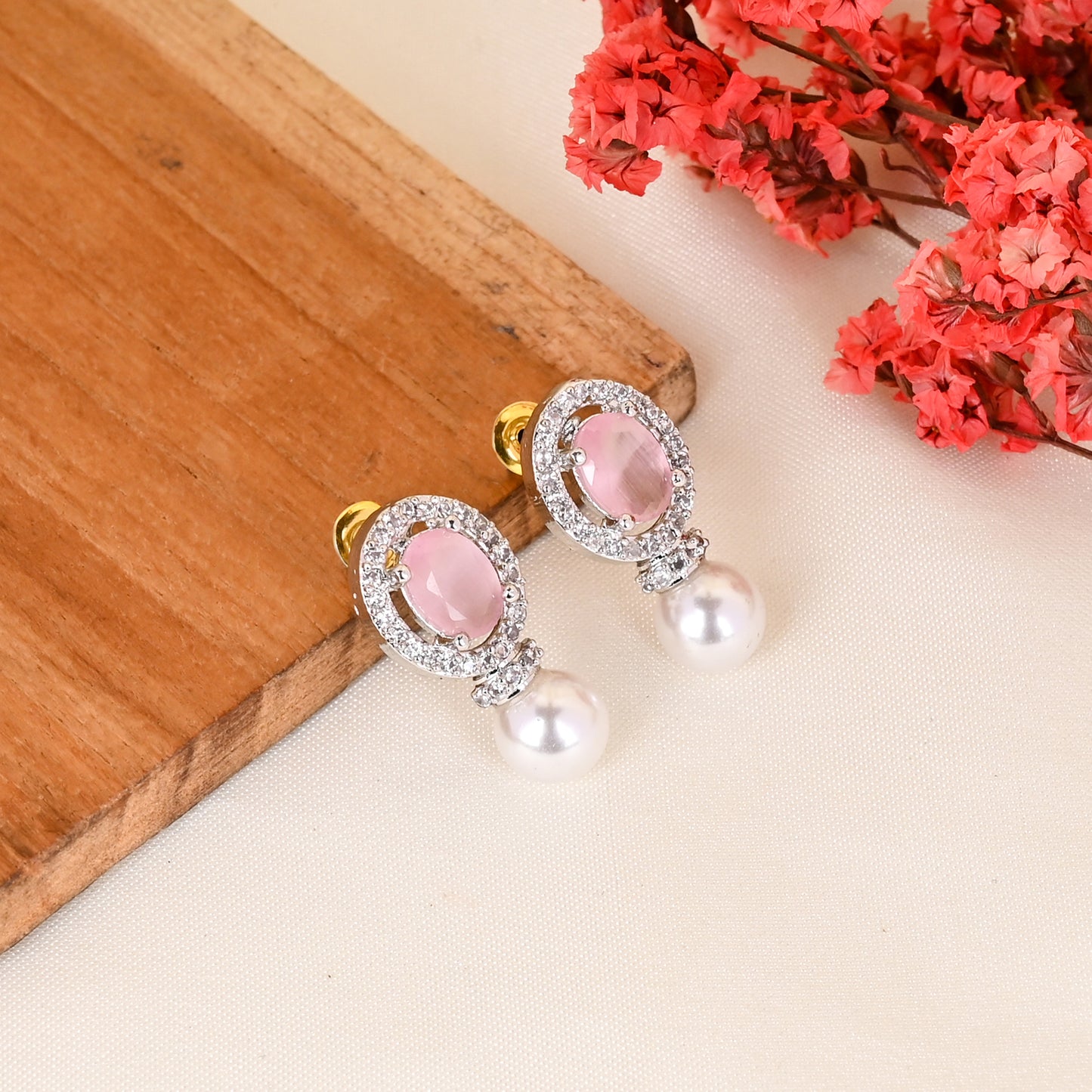 CKLAKART's NOOR Silver-Toned Pearl Drop Earrings Adorned with Pink Color Stones and Dazzling American Diamonds