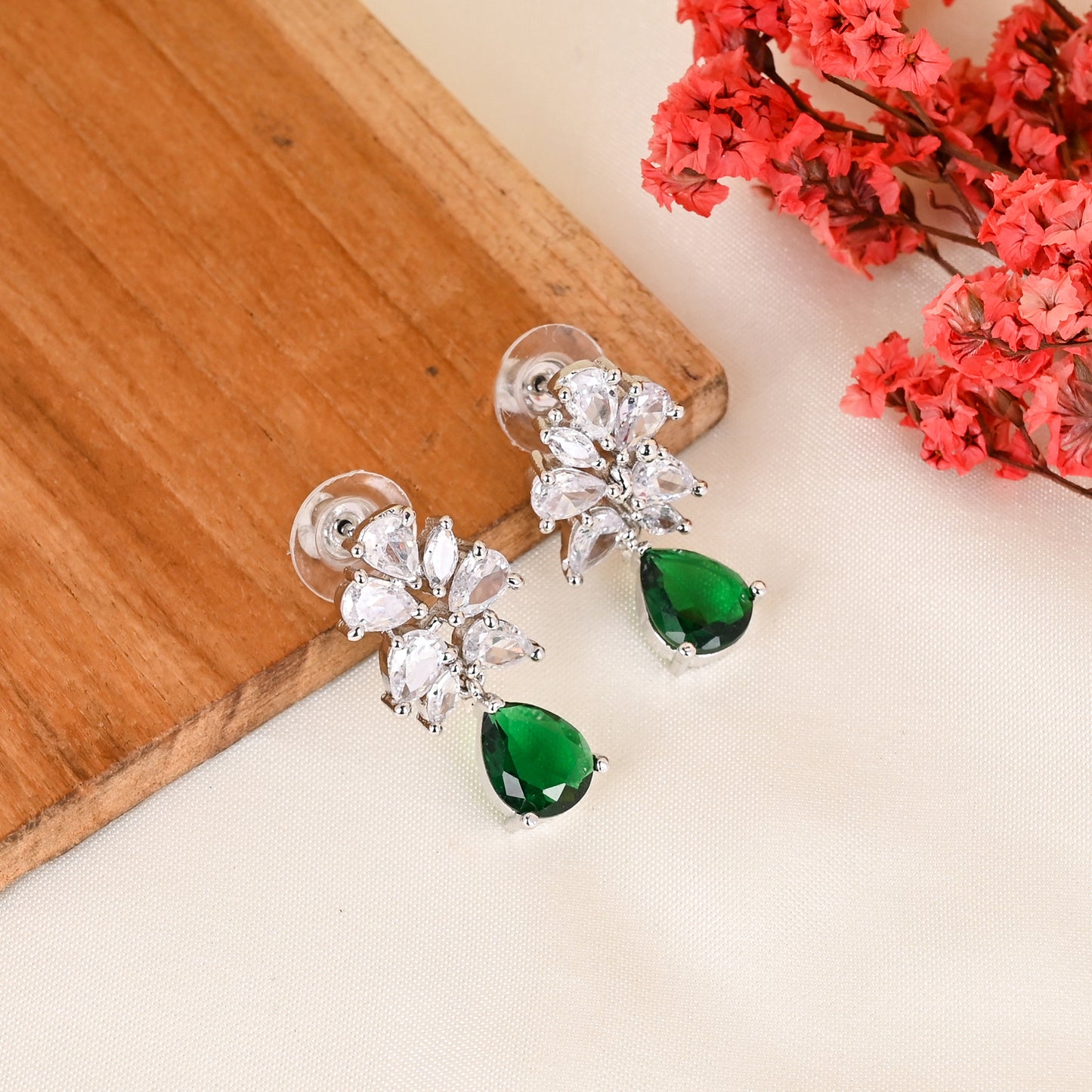 CKLAKART's NOOR Classic Silver-Toned Drop Earrings with Emerald Green Color Stones and Sophisticated American Diamonds