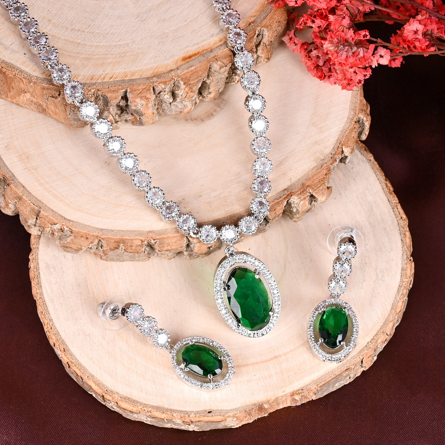 CKLAKART's NOOR Silver-Toned Oval Drop Necklace Set Adorned with Emerald Green Stones and Dazzling American Diamonds