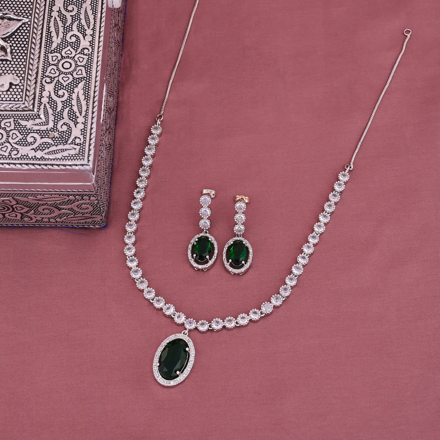 CKLAKART's NOOR Silver-Toned Oval Drop Necklace Set Adorned with Emerald Green Stones and Dazzling American Diamonds