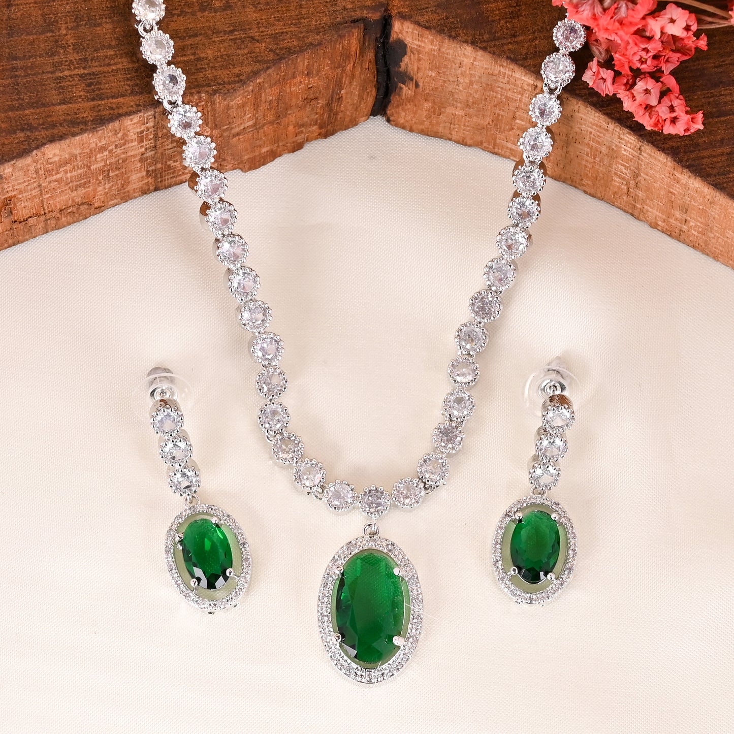 CKLAKART's NOOR Silver-Toned Oval Drop Necklace Set Adorned with Emerald Green Stones and Dazzling American Diamonds