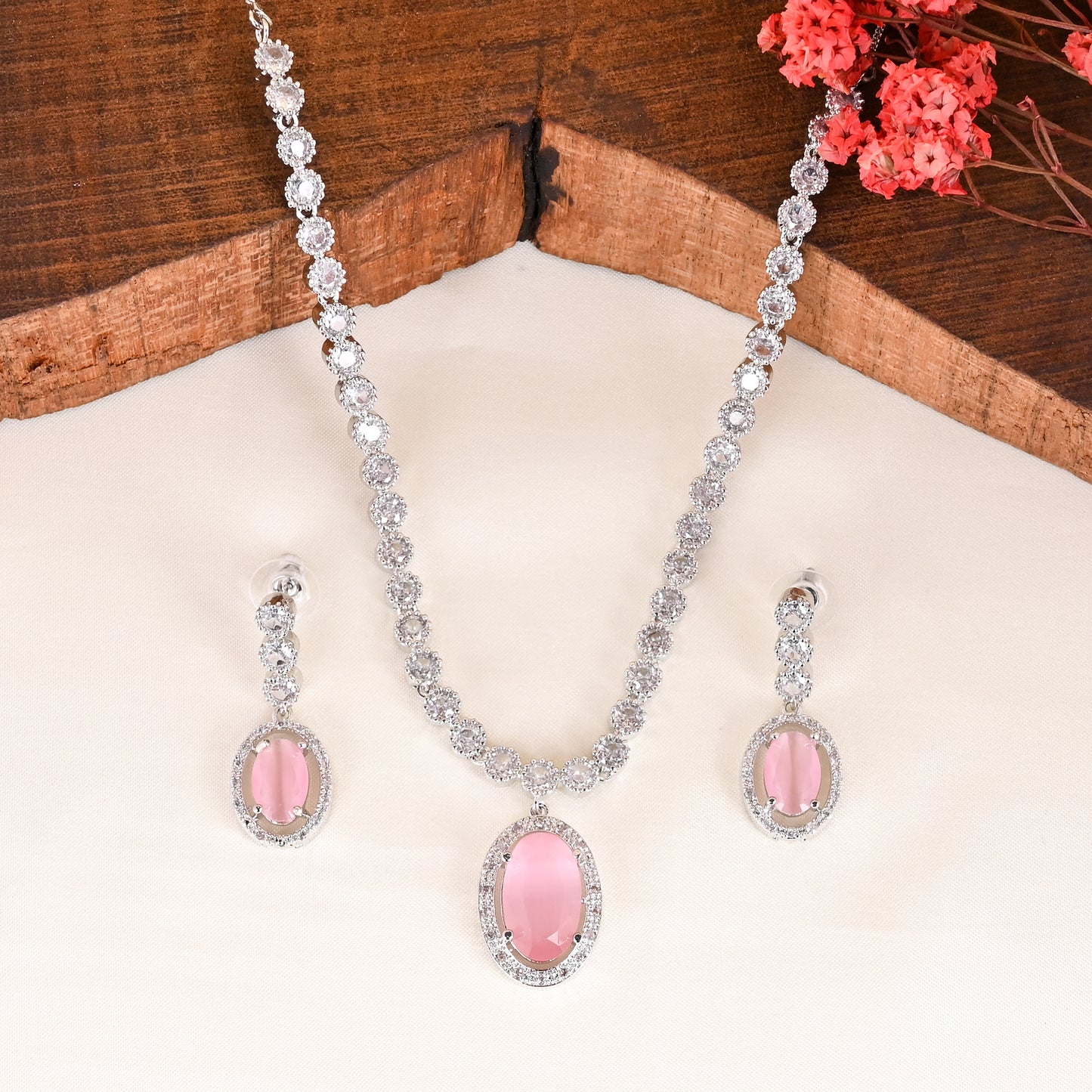 CKLAKART's NOOR Silver-Toned Oval Drop Necklace Set Adorned with Pink Stones and Dazzling American Diamonds